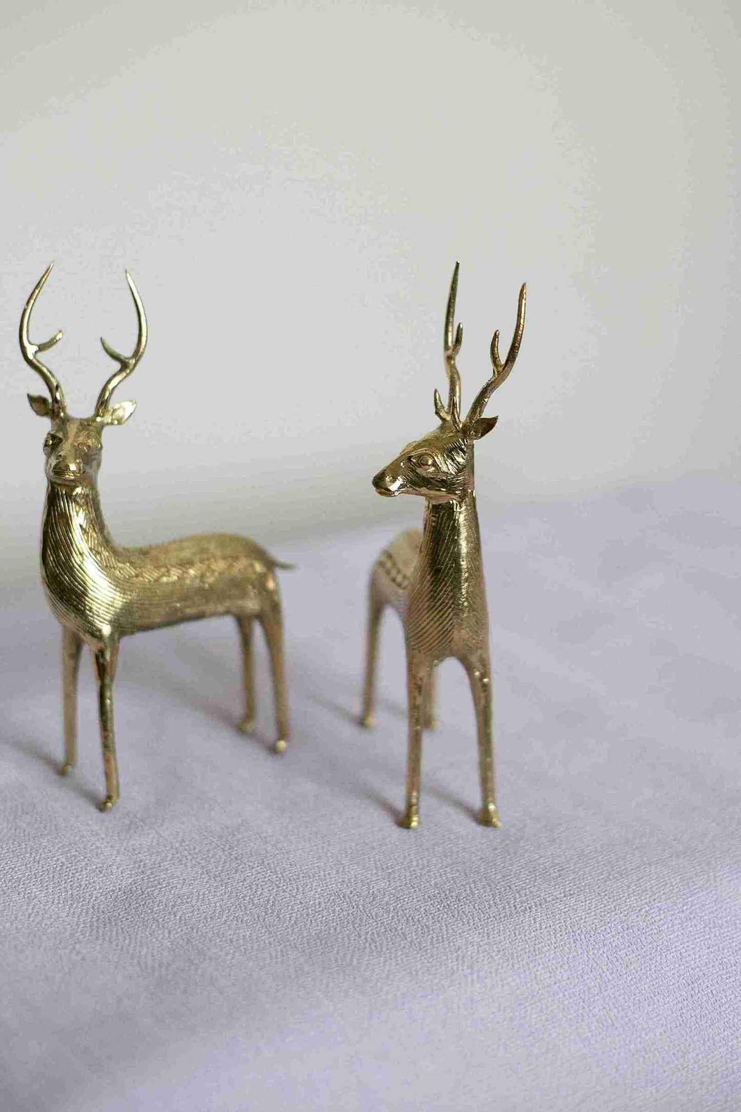 Brass standing deer pair in Dokra style showpiece from Divine Handicrafts