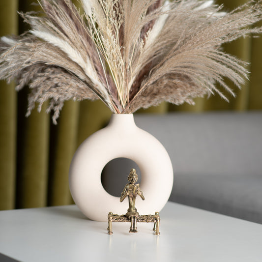 Sitting Women Reading on Bed Dhokra Home Decor