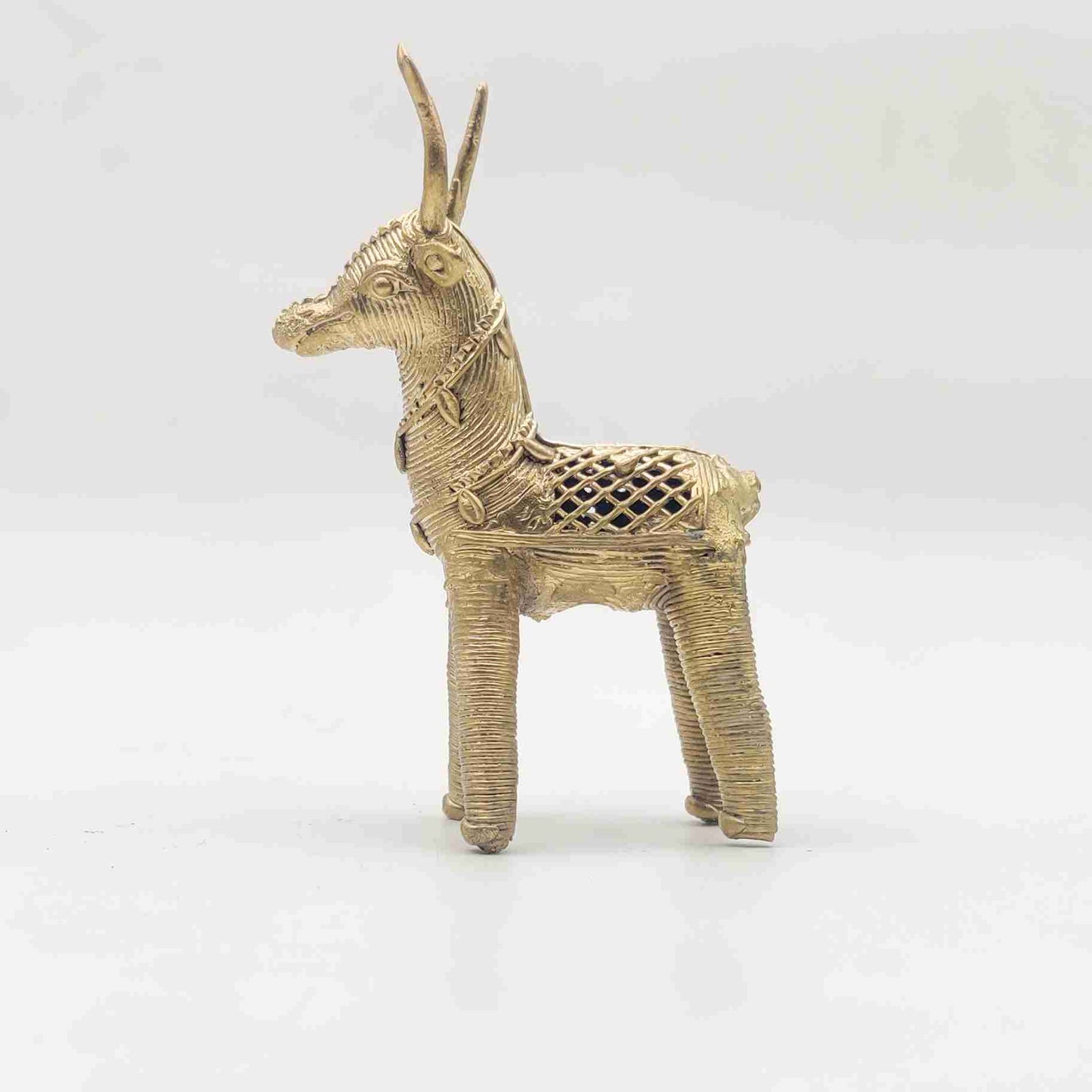 Handmade brass deer figurine in Dhokra art style, symbolizing prosperity and elegance