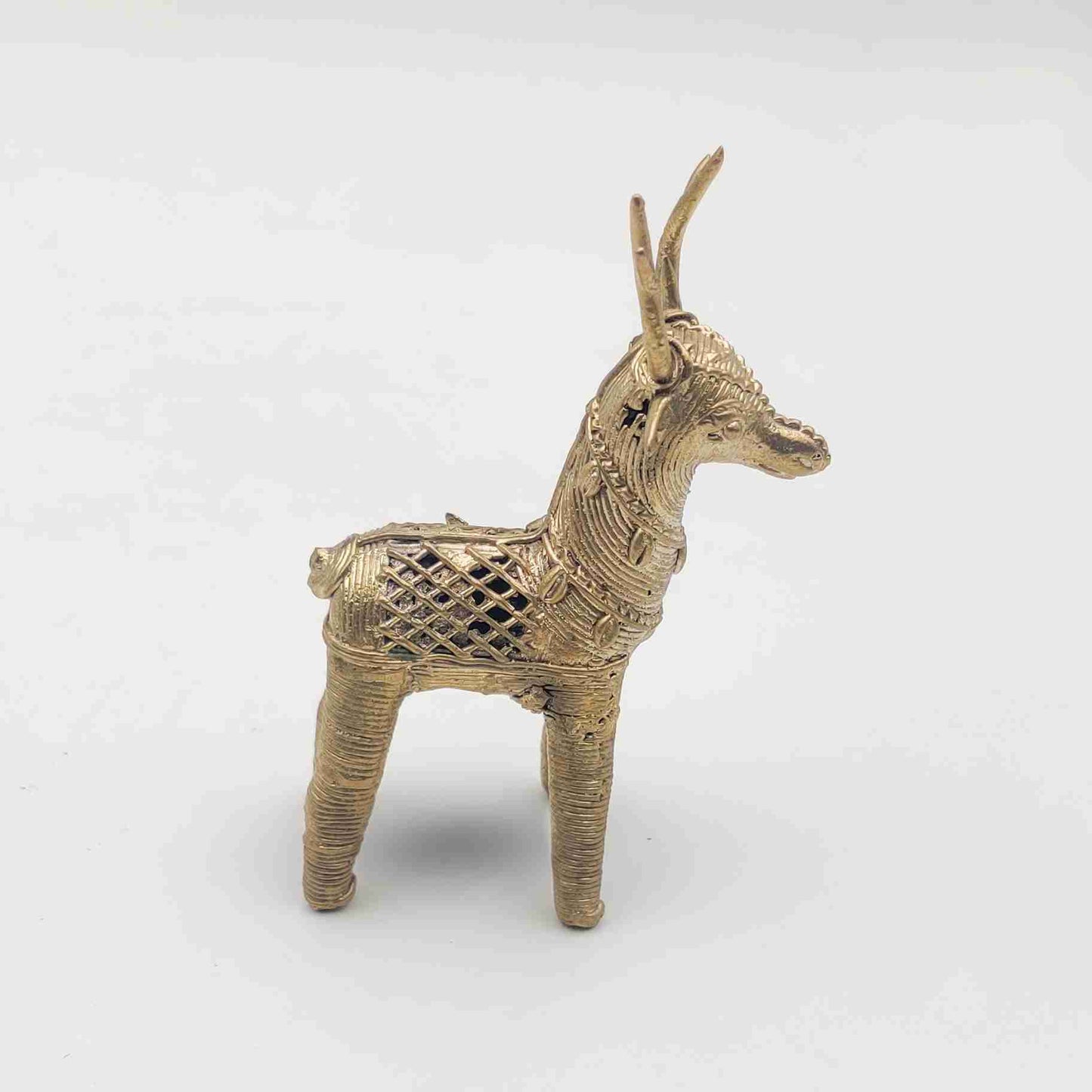 Handmade brass deer figurine in Dhokra art style, symbolizing prosperity and elegance