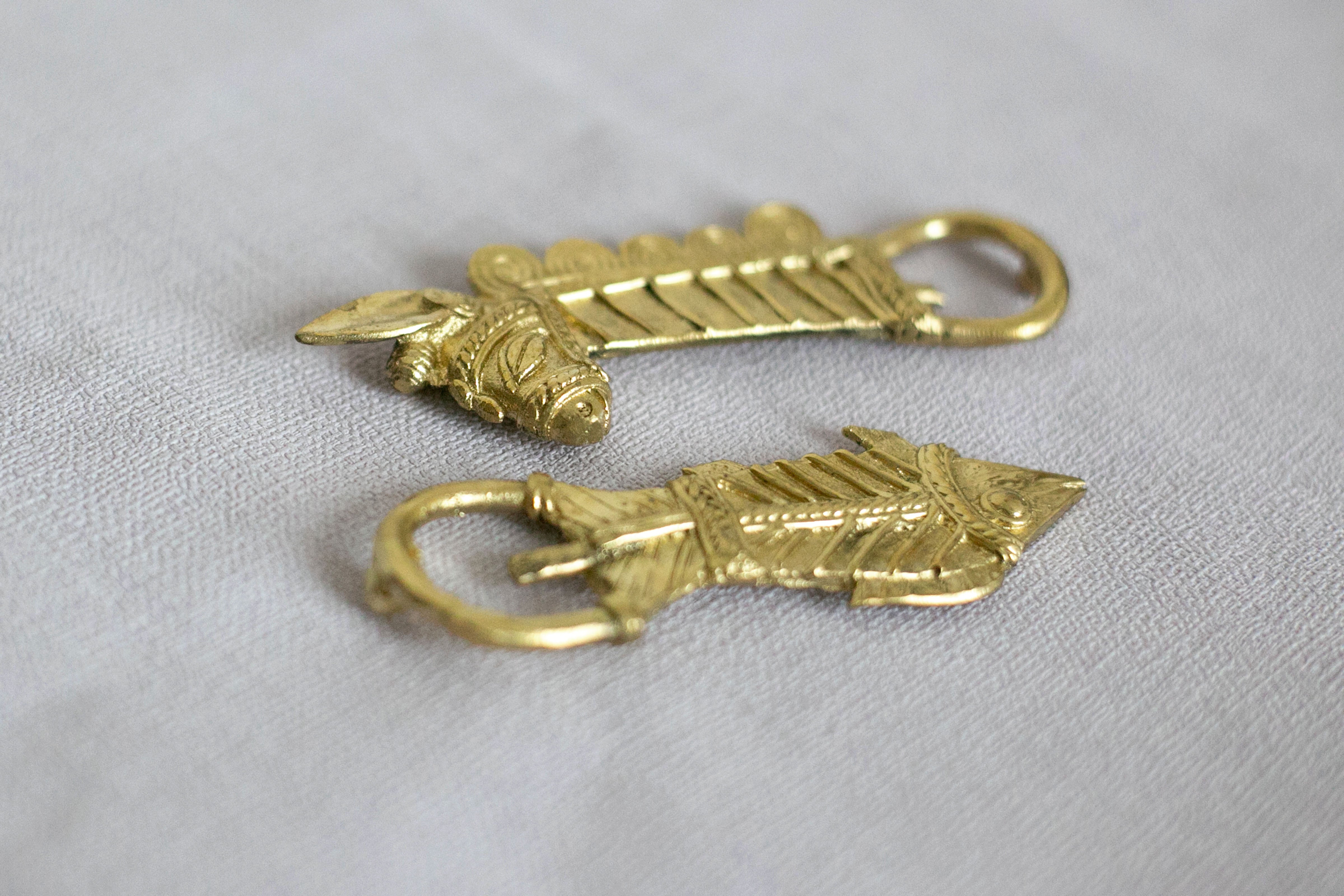 Vintage style metal hooks with artistic carvings