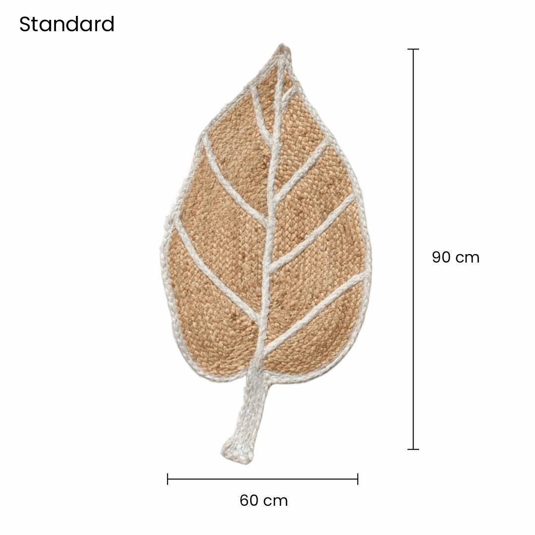 Leaf-shaped decorative pillow with measurements on a white background