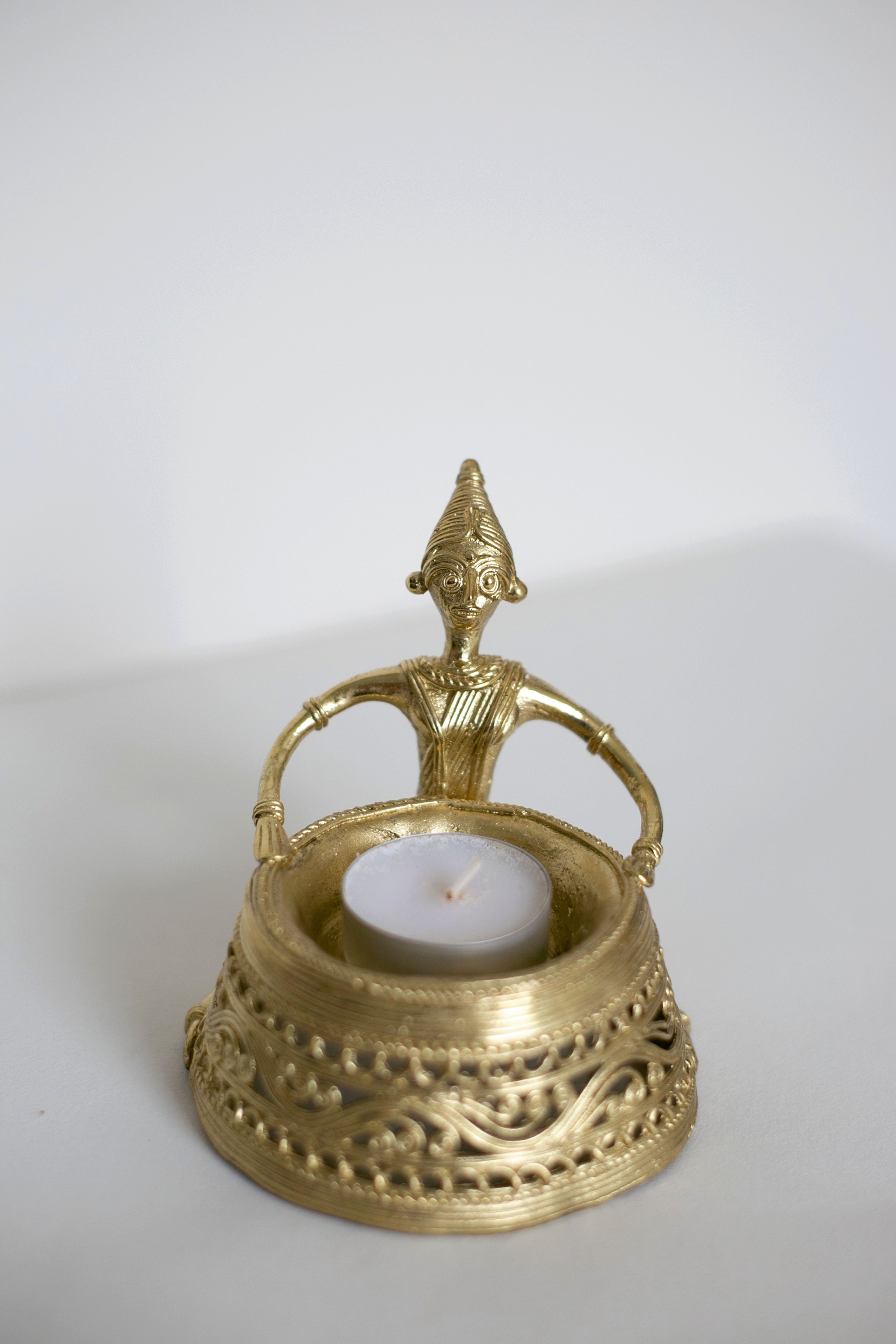Antique style brass tealight holder with figurine handle