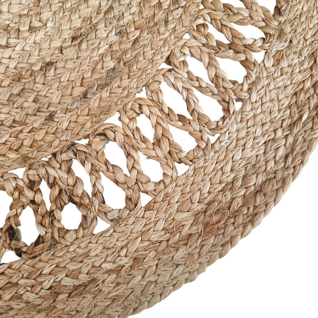 Close-up of a woven jute mat with a natural brown color on a white background