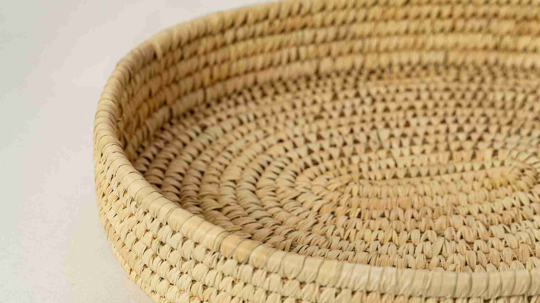 Close-up of a woven basket on a light background