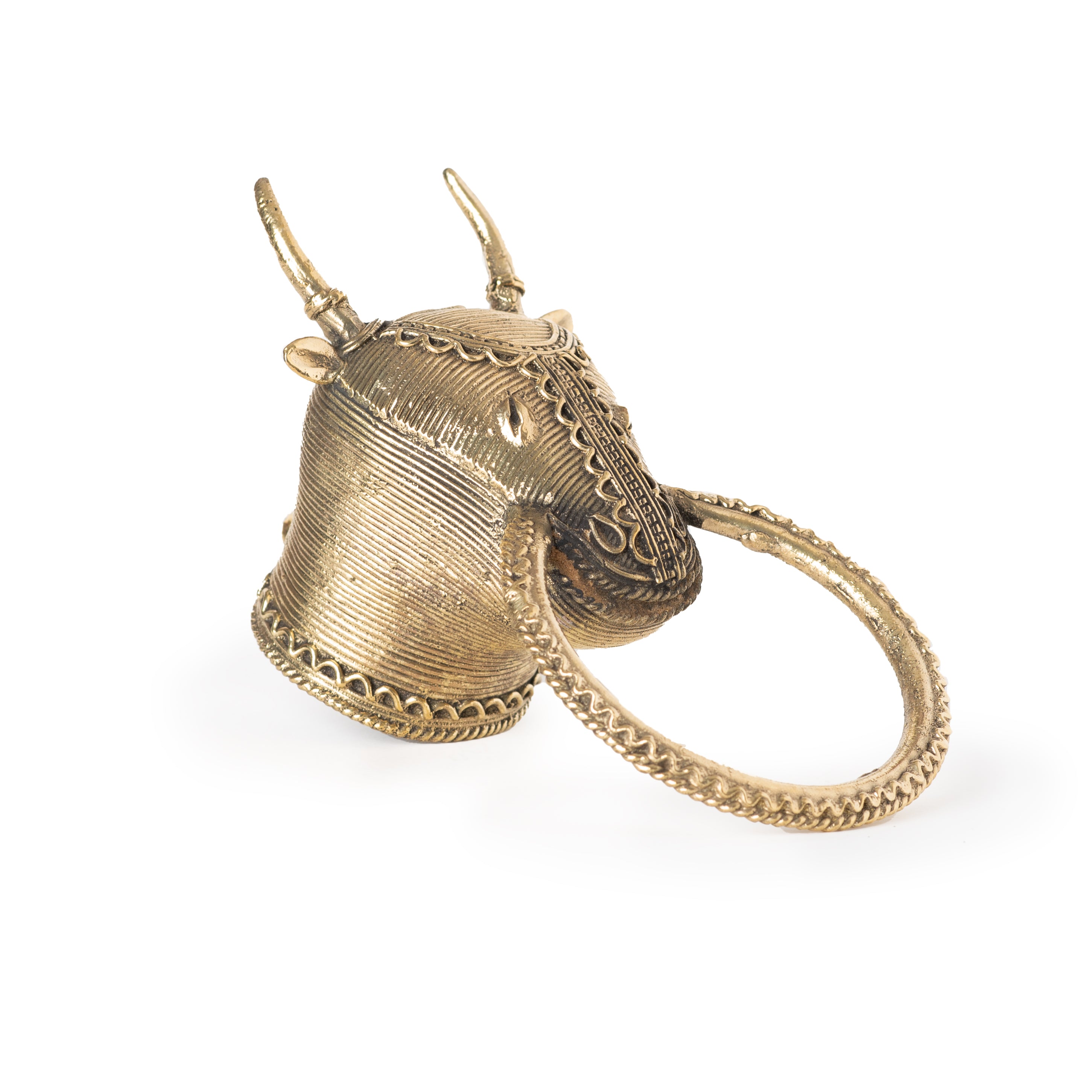 This item is a brass towel ring or wall holder featuring a traditional Indian Dhokra art design of a Nandi bull head. 