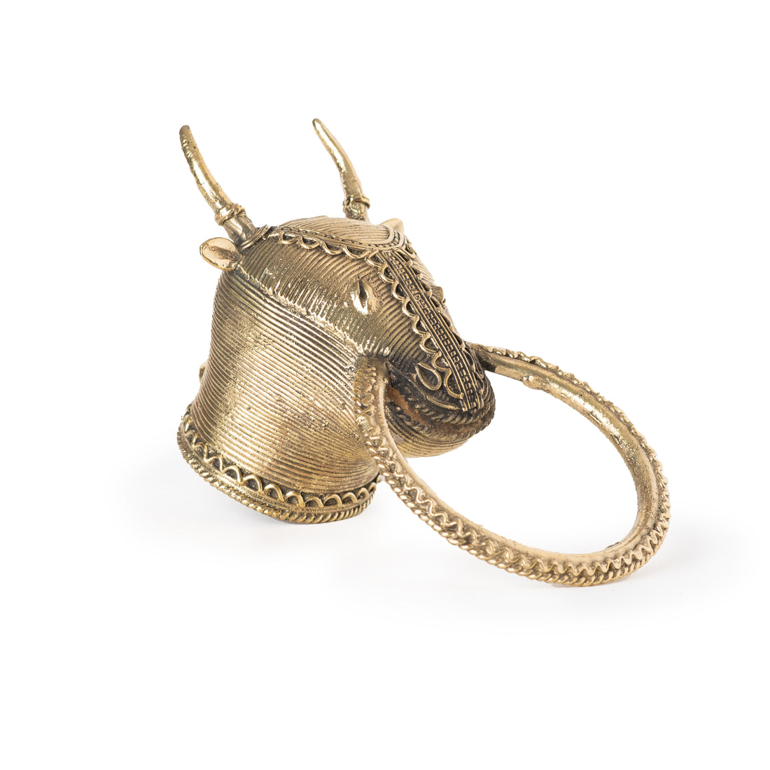 This item is a brass towel ring or wall holder featuring a traditional Indian Dhokra art design of a Nandi bull head. 