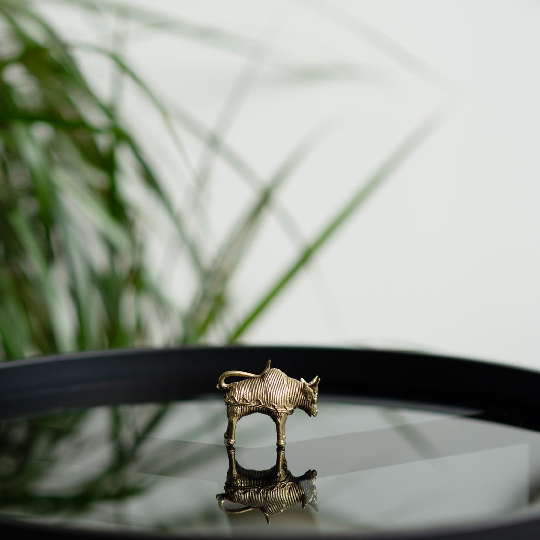 Metal sculptures of a bull