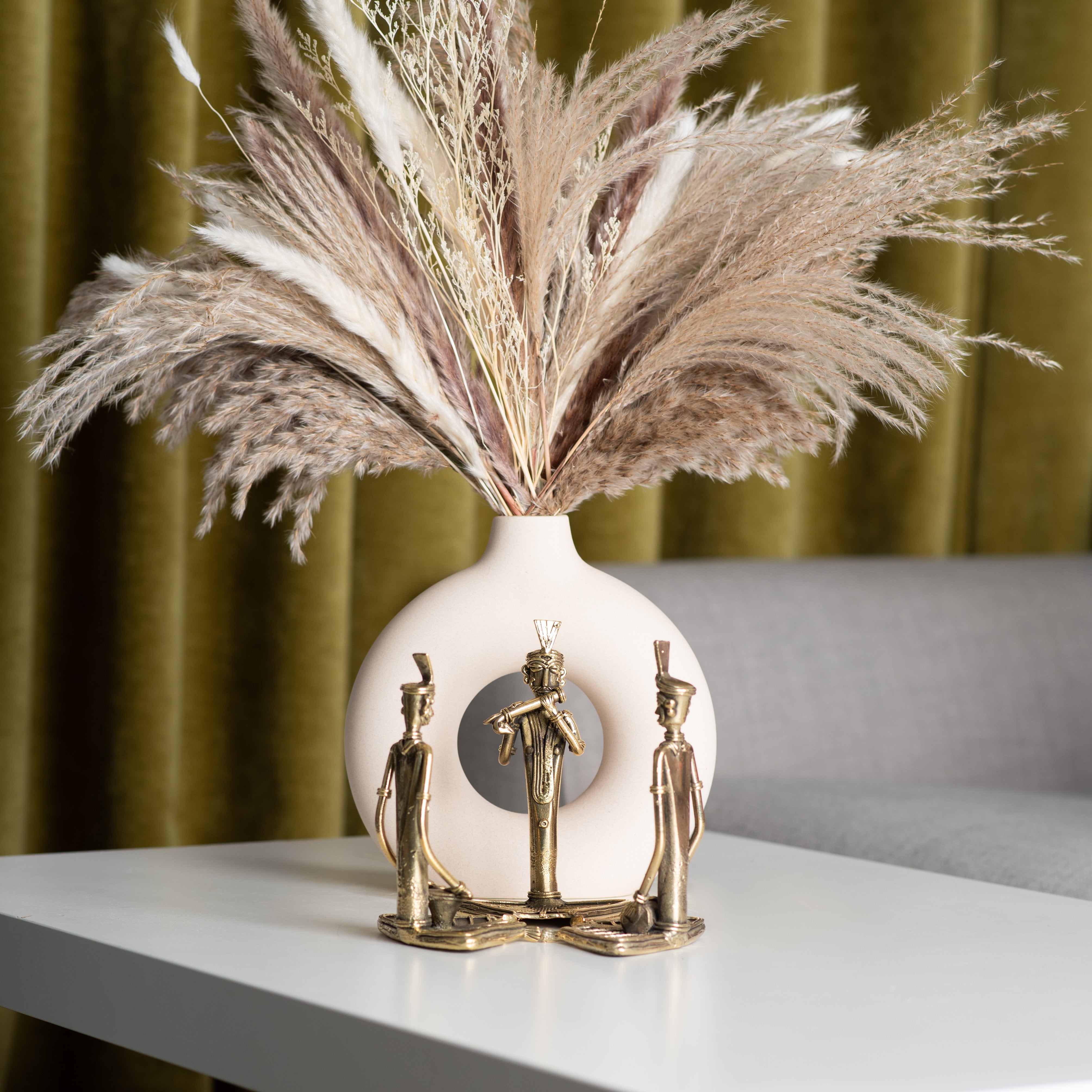 Stylish interior setup featuring vase and figurines