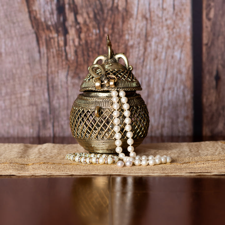 A vintage-style metal jewellery box 