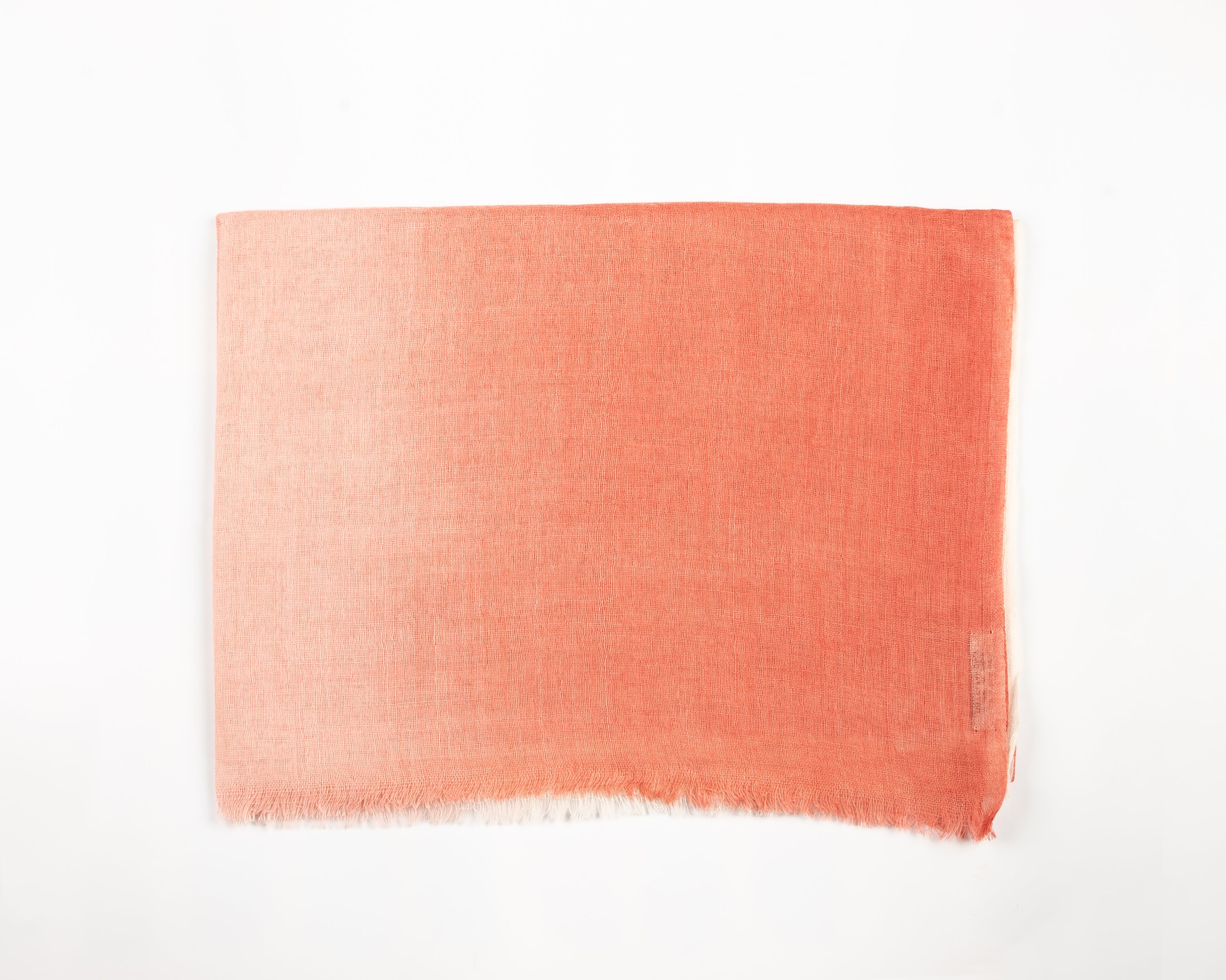 Craft fabric sample in mixed orange shades with natural frayed border