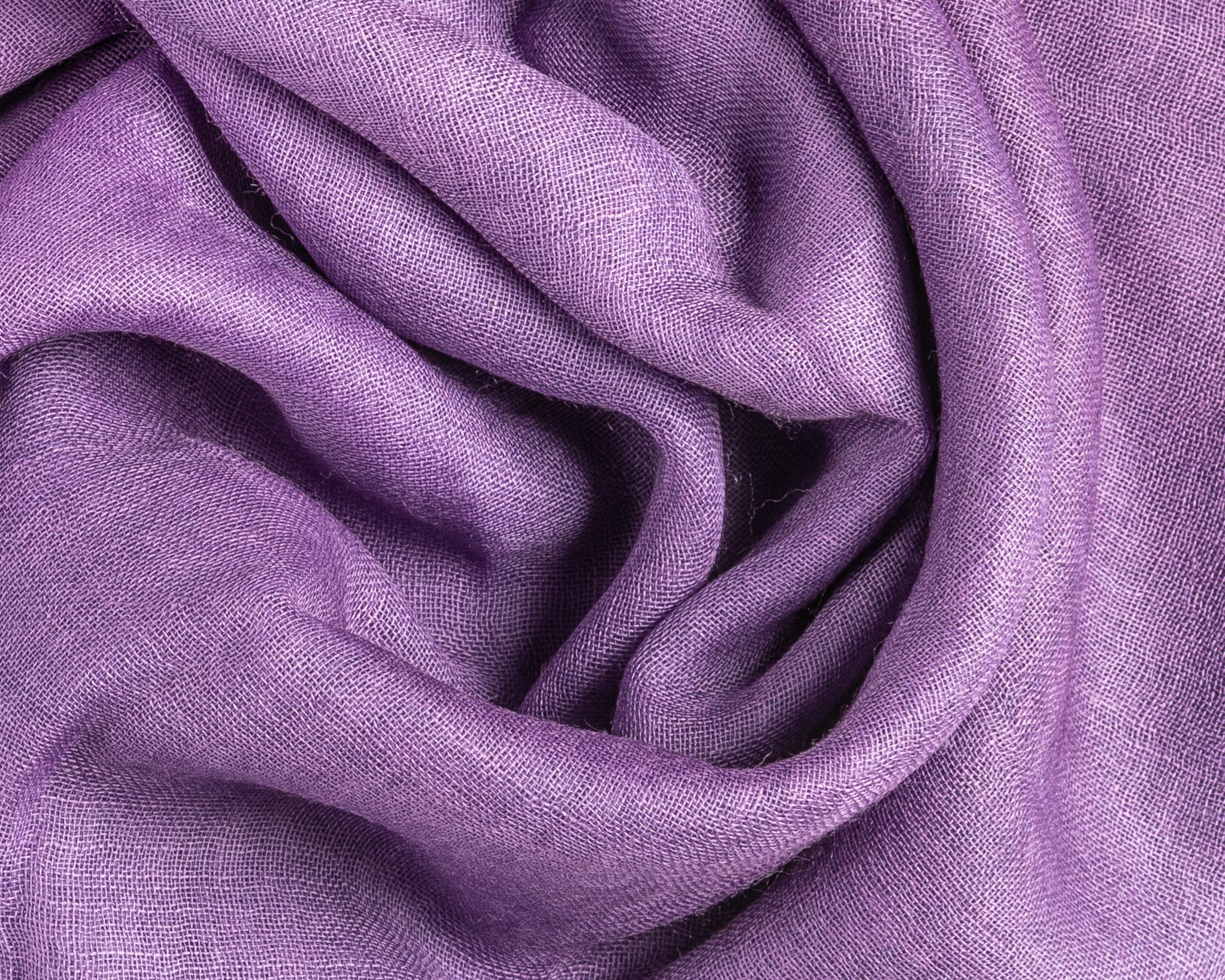 High-quality fabric in rich purple color with visible fibers