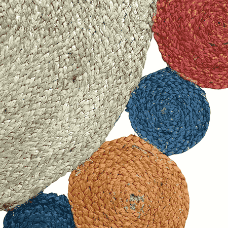 Close-up of textured round objects in various colors on a white background