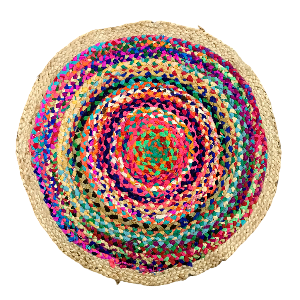 A handwoven round jute chindi braid rag rug with multicolor patterns, made from natural recycled cotton.
