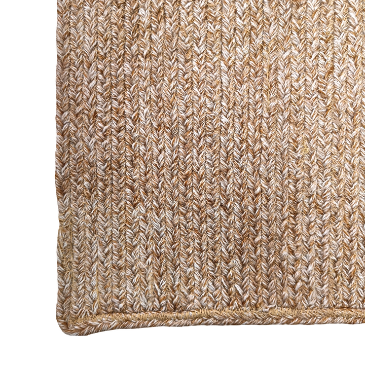 Natural fiber hand-woven braided rug
