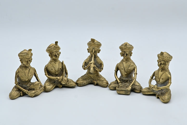 These statues are a set of Indian Dhokra brass tribal folk musician figurines, hand-cast using the ancient lost-wax technique. 