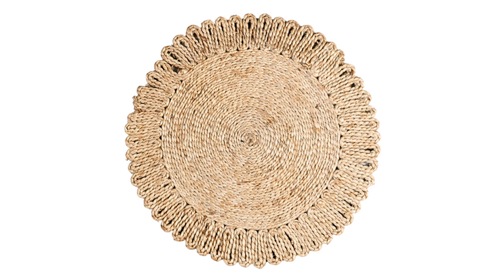 Round woven placemat on a white background