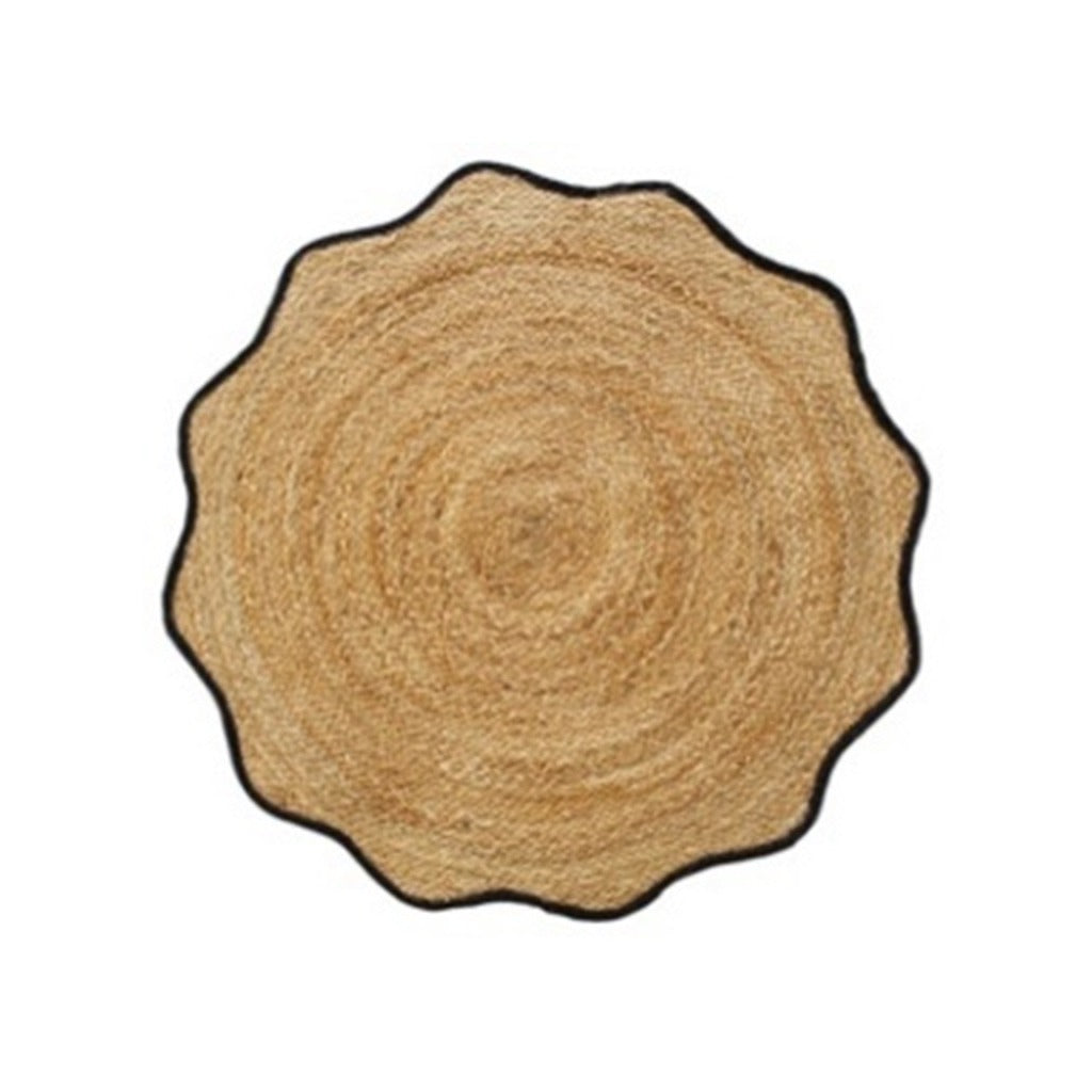 A round shaped, braided jute rug with a black border.