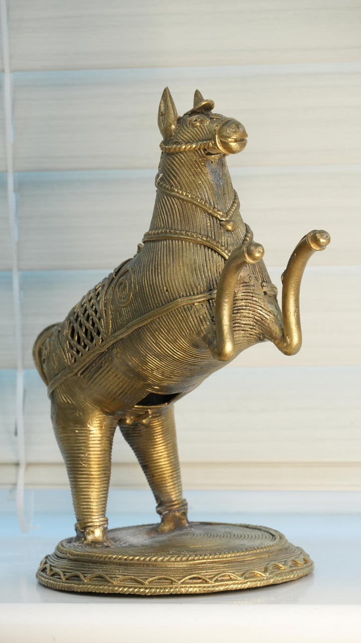 Bronze horse-shaped incense burner on a white background