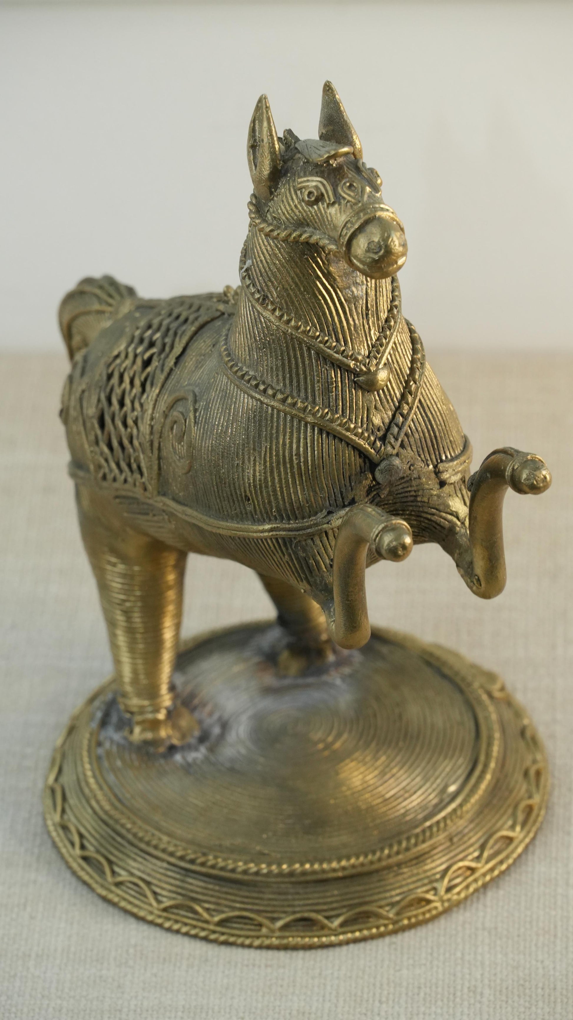 Bronze horse figurine on a white background