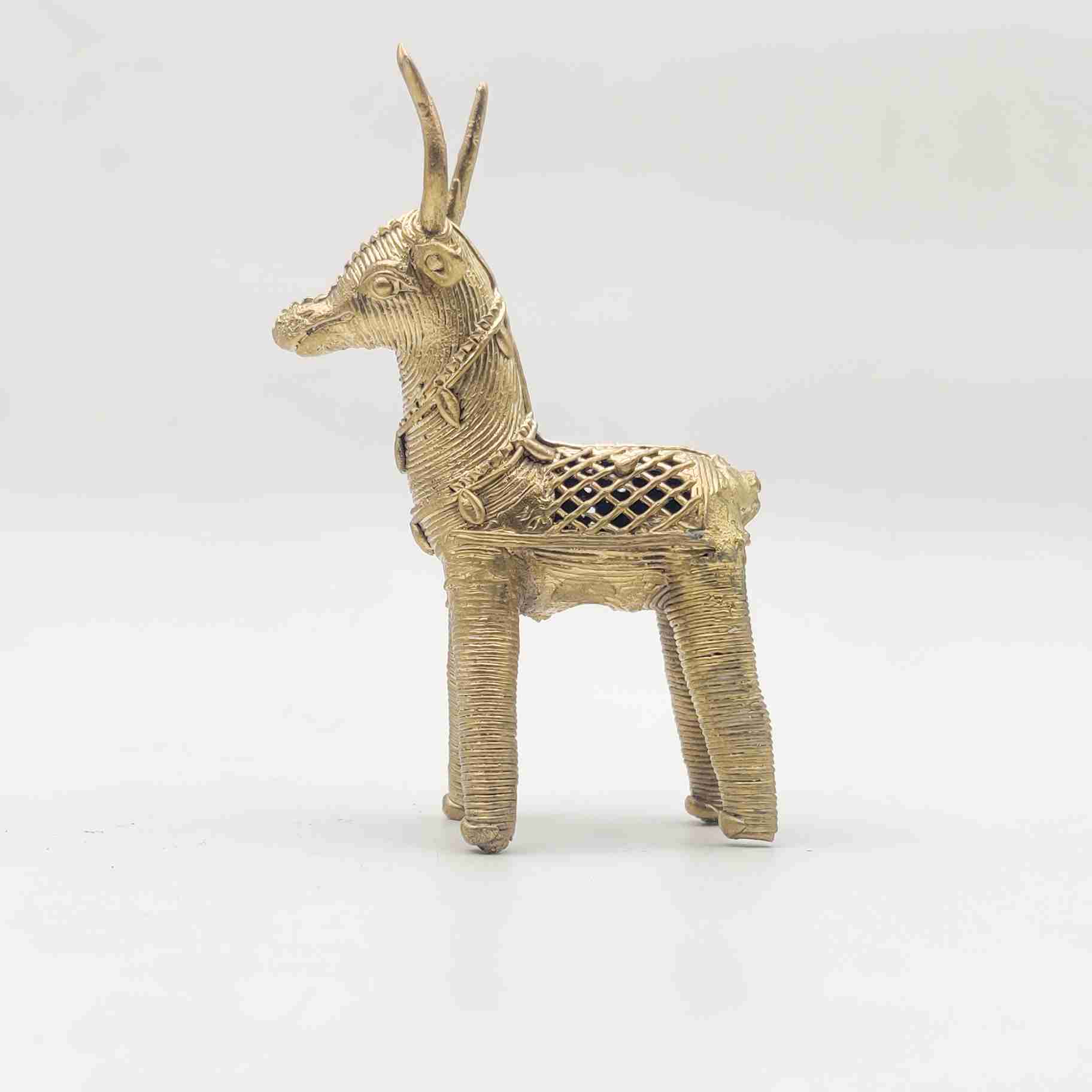 Handmade brass deer figurine in Dhokra art style, symbolizing prosperity and elegance