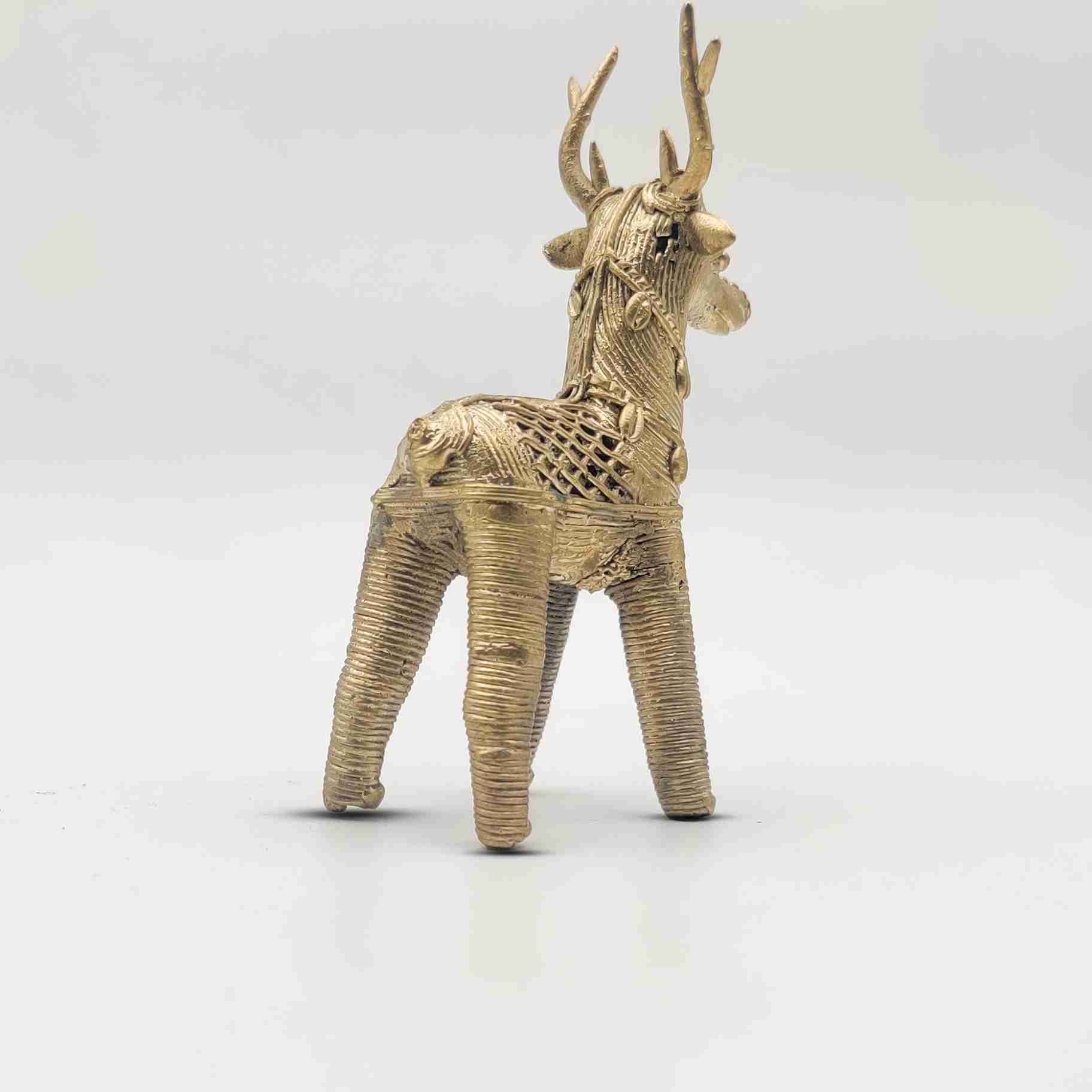 Pair of brass deer figurines in a Dhokra style from Divine Handicrafts