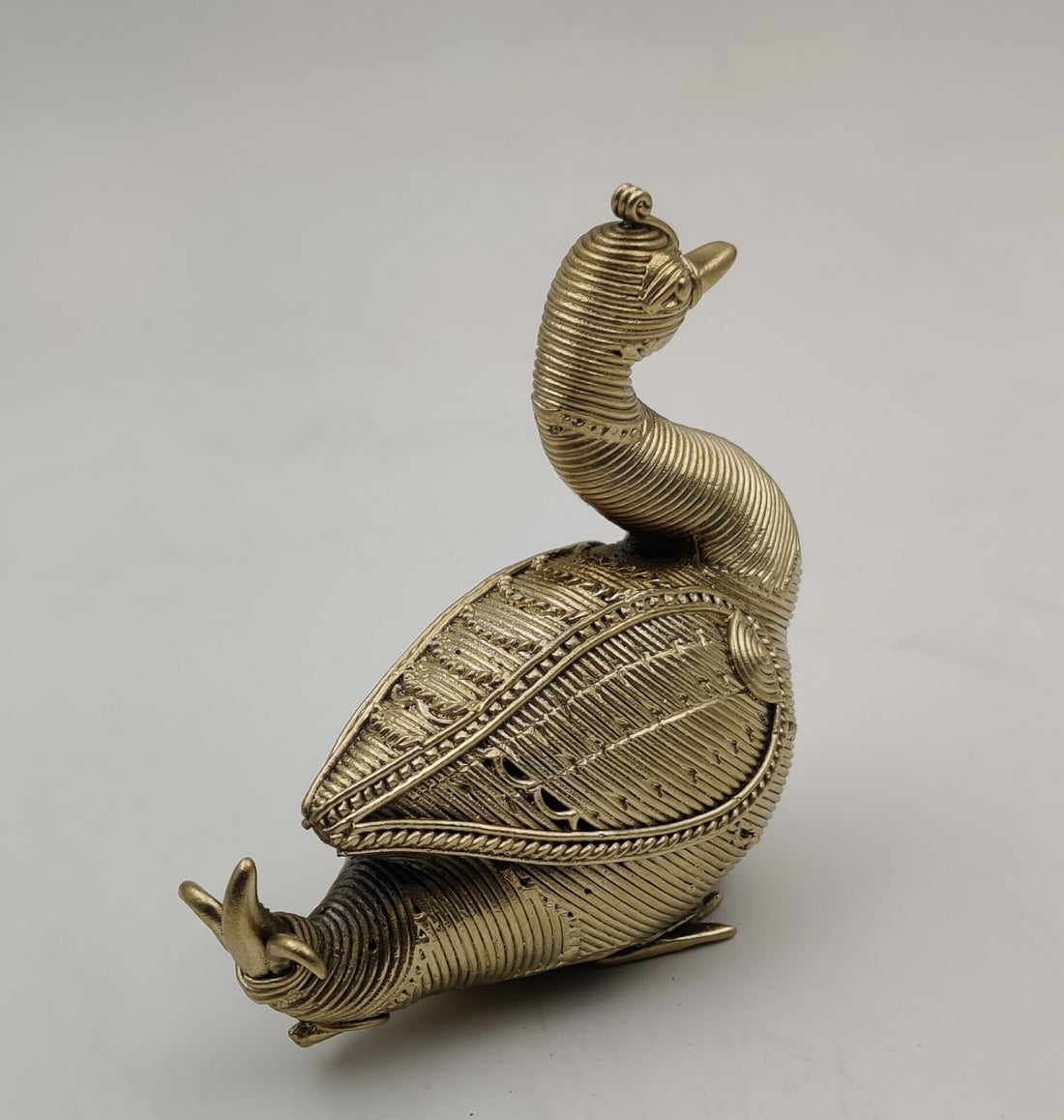 A metal swan figurine 
